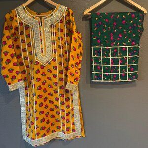 Vibrant Traditional Punjabi Suit with Intricate Embroidery and Patchwork